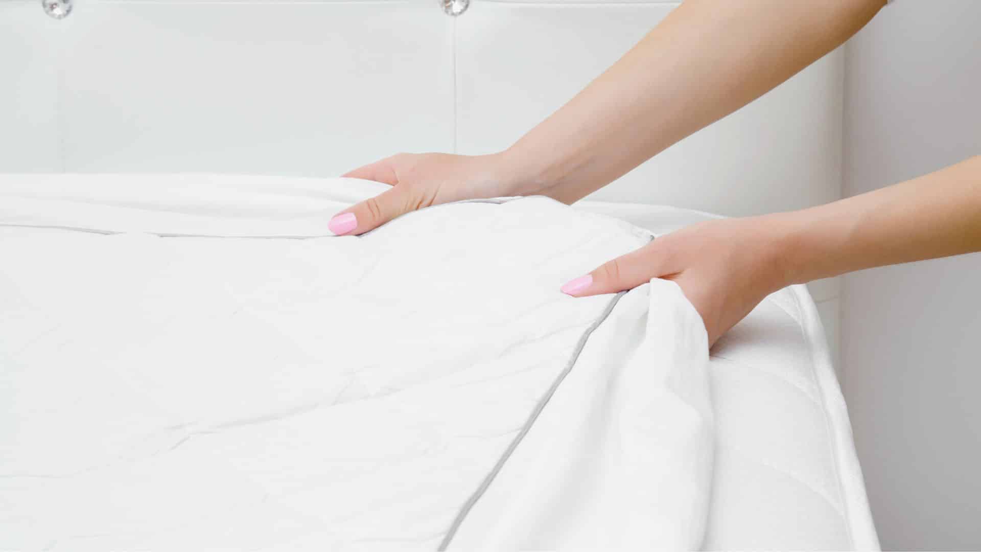 Putting on a mattress protector