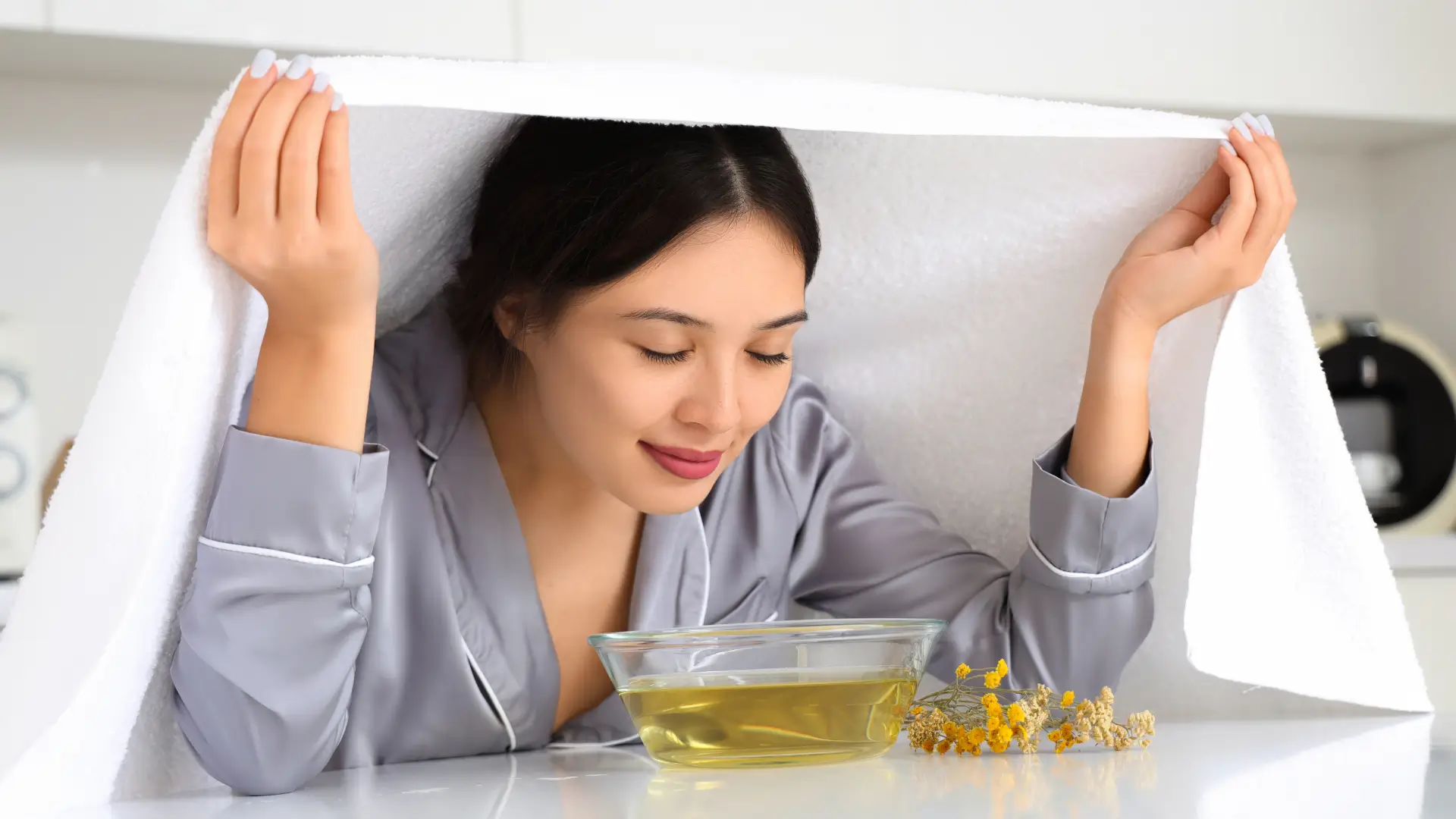 Woman trying steam inhalation