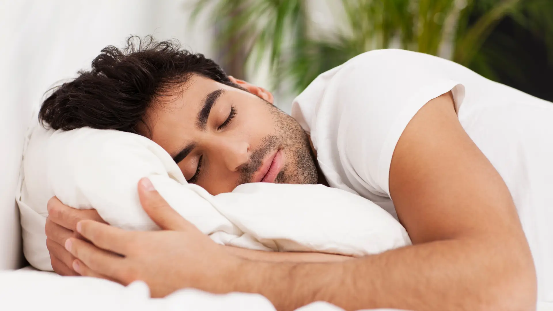 Man sleeping on his stomach